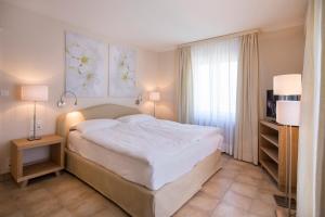 Postel nebo postele na pokoji v ubytování Villa Delta Suites House
