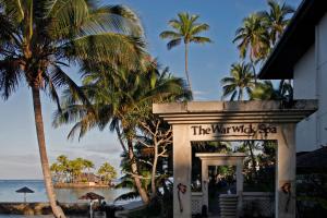 a building with a sign that reads the wax walk star at The Warwick Fiji in Korolevu