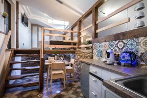 Küche/Küchenzeile in der Unterkunft Luxusní Apartmán NMNM Mezonet