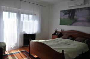 Postel nebo postele na pokoji v ubytování Sunnyside Hévíz