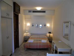 Ένα ή περισσότερα κρεβάτια σε δωμάτιο στο Villa Electra