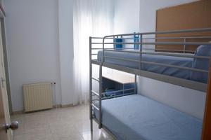Postel nebo postele na pokoji v ubytování Residencia Universitaria Cadiz Centro