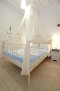 מיטה או מיטות בחדר ב-Lino Apartments
