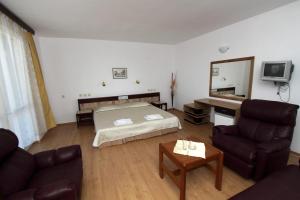 TV a/nebo společenská místnost v ubytování Family Hotel Verona