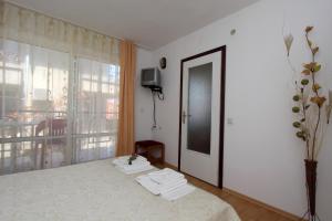 Postel nebo postele na pokoji v ubytování Family Hotel Verona