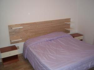 Postel nebo postele na pokoji v ubytování Appartamento Gronda Lagunare