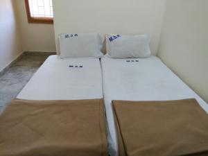Postel nebo postele na pokoji v ubytování MSR Lodge