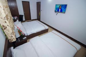 Postel nebo postele na pokoji v ubytování Hotel Progati Inn Ltd.