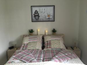 מיטה או מיטות בחדר ב-Apartament Deluxe