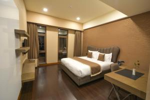Speke Apartments Wampewo客房内的一张或多张床位
