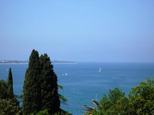 a view of the ocean with boats in the water at Roma in Portorož
