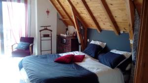 Postel nebo postele na pokoji v ubytování Ferme des Capellous