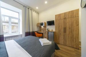 TV a/nebo společenská místnost v ubytování Partner Guest House Khreschatyk