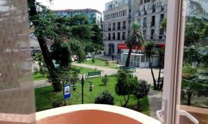 a view from a window of a city with a park at Old Street Guesthouse in Batumi