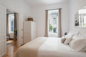 Posteľ alebo postele v izbe v ubytovaní Athens Residence Apartments