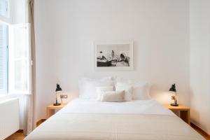 Posteľ alebo postele v izbe v ubytovaní Athens Residence Apartments