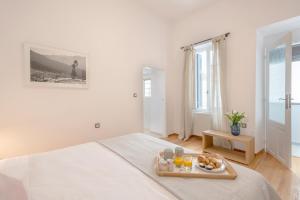 Posteľ alebo postele v izbe v ubytovaní Athens Residence Apartments