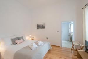 Posteľ alebo postele v izbe v ubytovaní Athens Residence Apartments