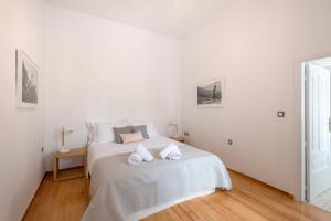 Posteľ alebo postele v izbe v ubytovaní Athens Residence Apartments