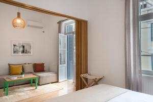 Posteľ alebo postele v izbe v ubytovaní Athens Residence Apartments