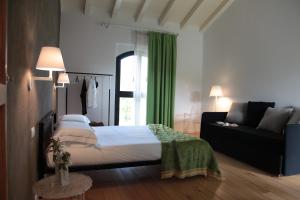 Posteľ alebo postele v izbe v ubytovaní Talè Restaurant & Suite