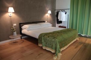 Postel nebo postele na pokoji v ubytování Talè Restaurant & Suite