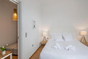Posteľ alebo postele v izbe v ubytovaní Athens Residence Apartments