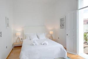 Posteľ alebo postele v izbe v ubytovaní Athens Residence Apartments
