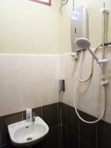 Et badeværelse på HR Iman Homestay