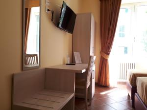 TV a/nebo společenská místnost v ubytování Clodio Rooms