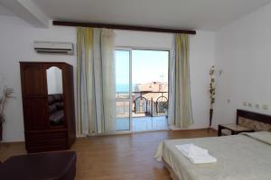 Postel nebo postele na pokoji v ubytování Family Hotel Verona