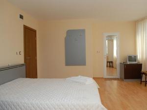 Postel nebo postele na pokoji v ubytování Family Hotel Bistritsa + 15 fotografií