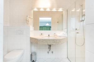 Kúpeľňa v ubytovaní Hotel Gasthof Zum Kirchenwirt