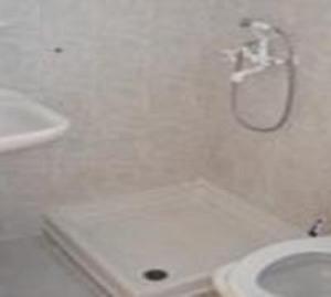 A bathroom at Antonis Hotel