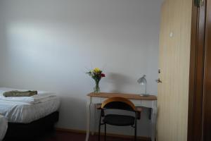 Katil atau katil-katil dalam bilik di Eidavellir Apartments and Rooms
