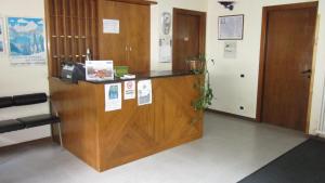 a reception desk in a hospital room with at Hotel Bel Sit in Madesimo