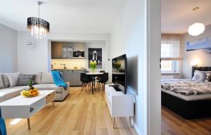 Μια τηλεόραση ή/και κέντρο ψυχαγωγίας στο Luxury Marina Apartment