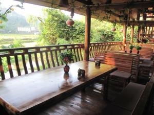 Balkón nebo terasa v ubytování Bridge View Boutique Guesthouse 望桥楼精品民宿