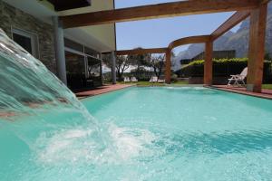The swimming pool at or close to Residence Rivachiara (check-in at Hotel Riviera in Viale Rovereto, 95)