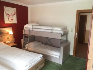 Postel nebo postele na pokoji v ubytování Pension Appartments Christoph