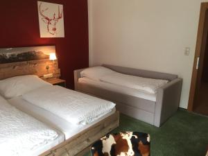 Postel nebo postele na pokoji v ubytování Pension Appartments Christoph