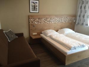 Postel nebo postele na pokoji v ubytování Pension Appartments Christoph