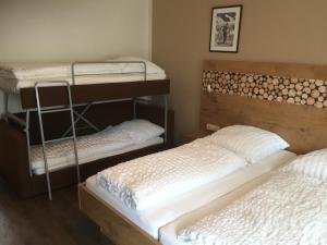 Postel nebo postele na pokoji v ubytování Pension Appartments Christoph