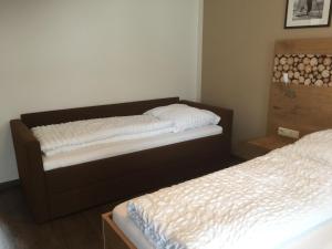 Postel nebo postele na pokoji v ubytování Pension Appartments Christoph
