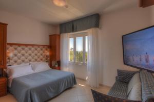 Кровать или кровати в номере Hotel Noris
