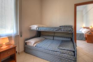 Кровать или кровати в номере Hotel Noris