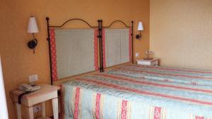 Postel nebo postele na pokoji v ubytování Hotel Campagna