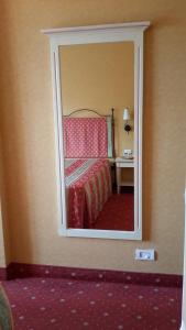 Postel nebo postele na pokoji v ubytování Hotel Campagna