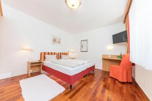Letto o letti in una camera di Hotel Zur Post