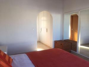 A bed or beds in a room at La Torre Alba - La Finca Golf Resort